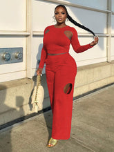 Zweiteiliges Crop-Top mit Cut-Outs und High-Waist-Hose